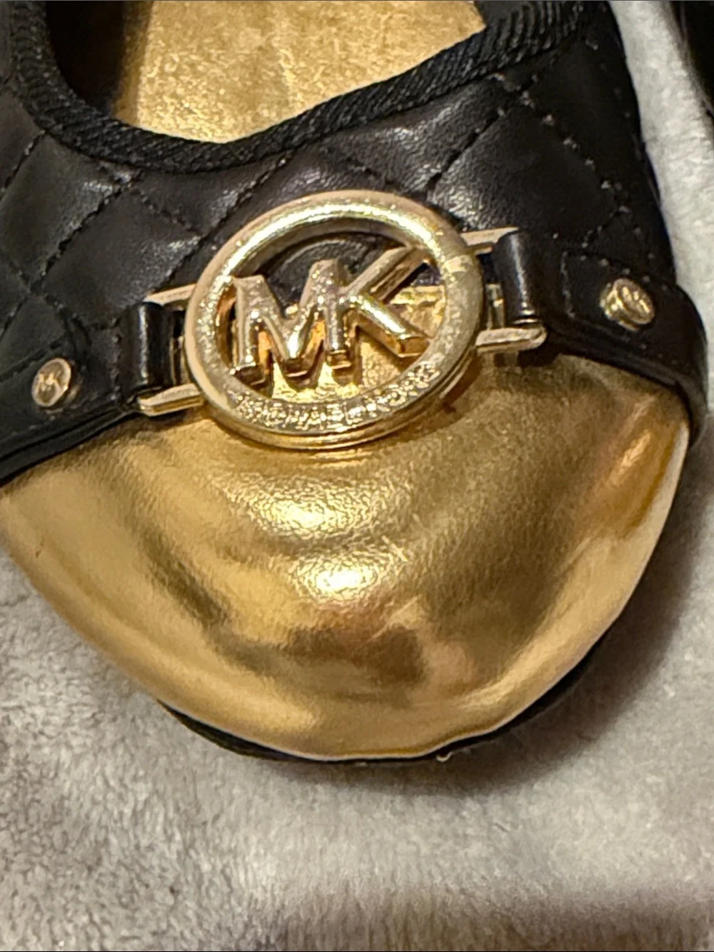 Michael Kors Black Quilted Ballet Flats with Gold Toe Caps